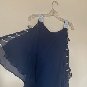 Elegant pant suit with sparkling trimmings on sleeve